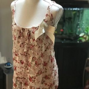 Beautiful and comfortable lace floral tank top.